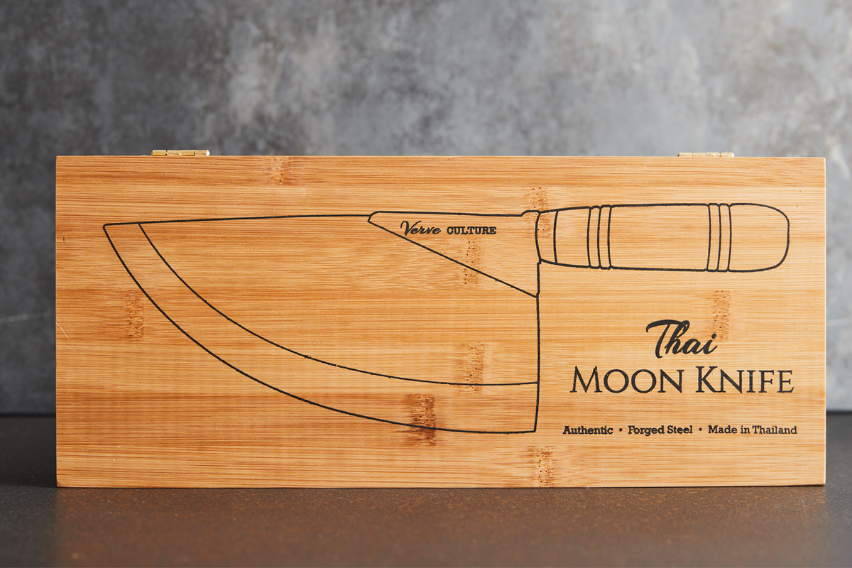 Bamboo box with engraved moon knife illustration, wooden handle design, and "Thai Moon Knife" text.