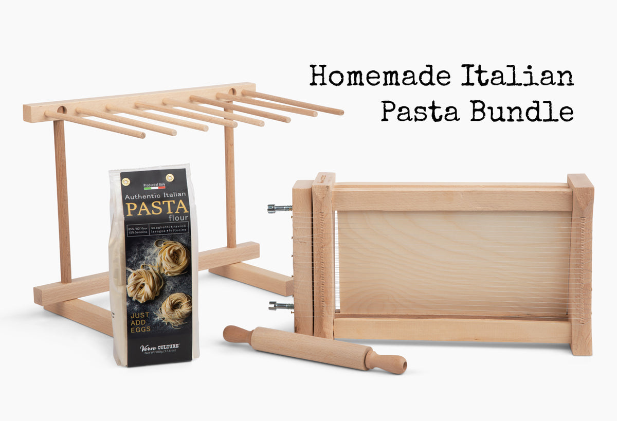 Wooden pasta-making kit with drying rack, pasta flour box, wooden frame with clamps, and rolling pin.
