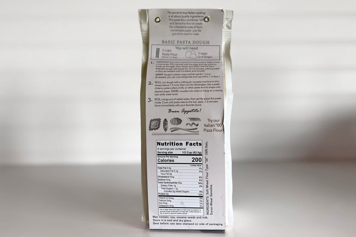 White pasta flour bag with basic pasta dough recipe, ingredients list, and nutrition facts label visible on front.