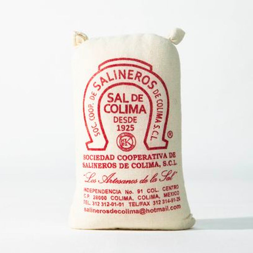 Cream canvas bag with red text and logo for Sal de Colima sea salt, featuring drawstring closure.