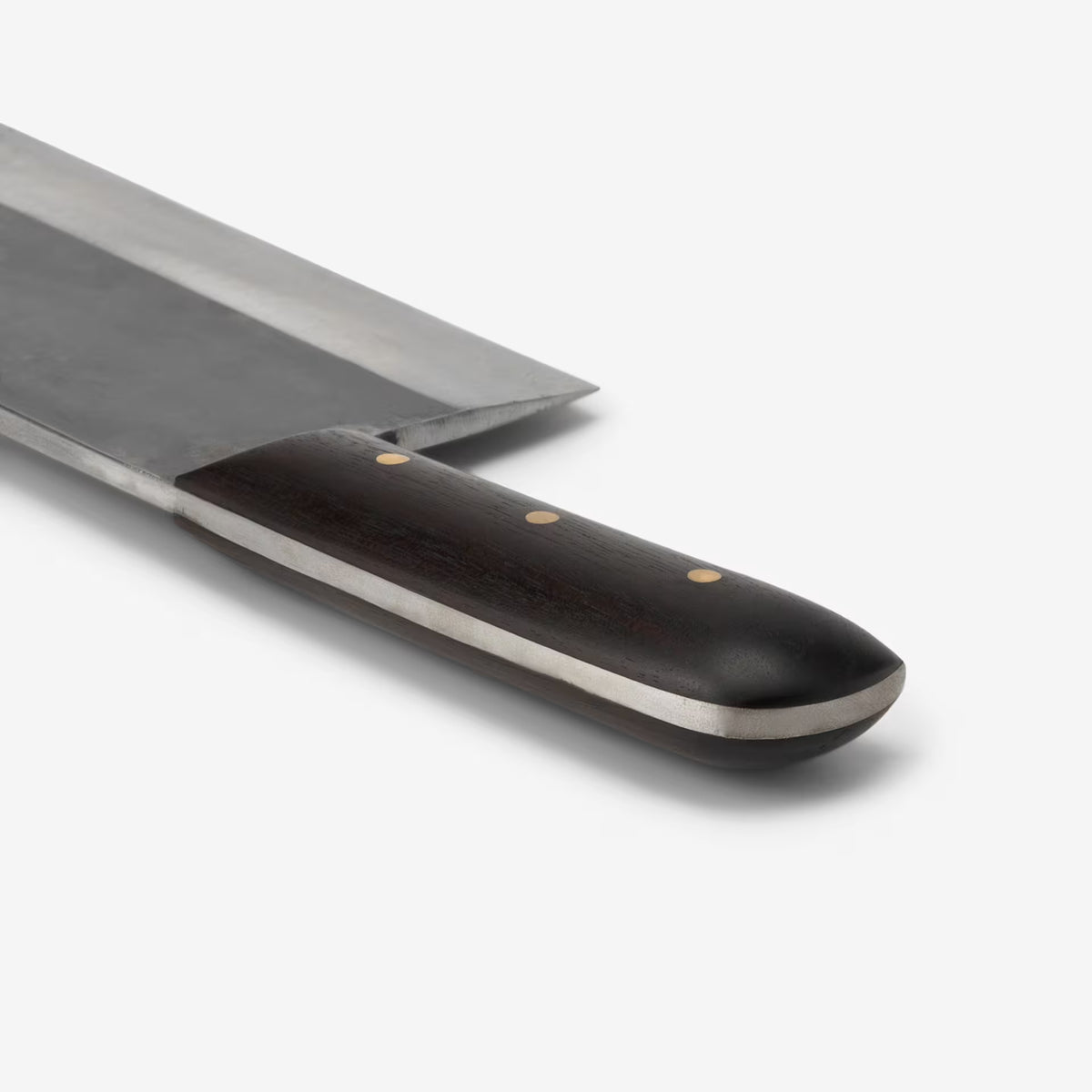 Two chef knives with black handles and brass rivets, one with a wide blade and one with a narrow blade.