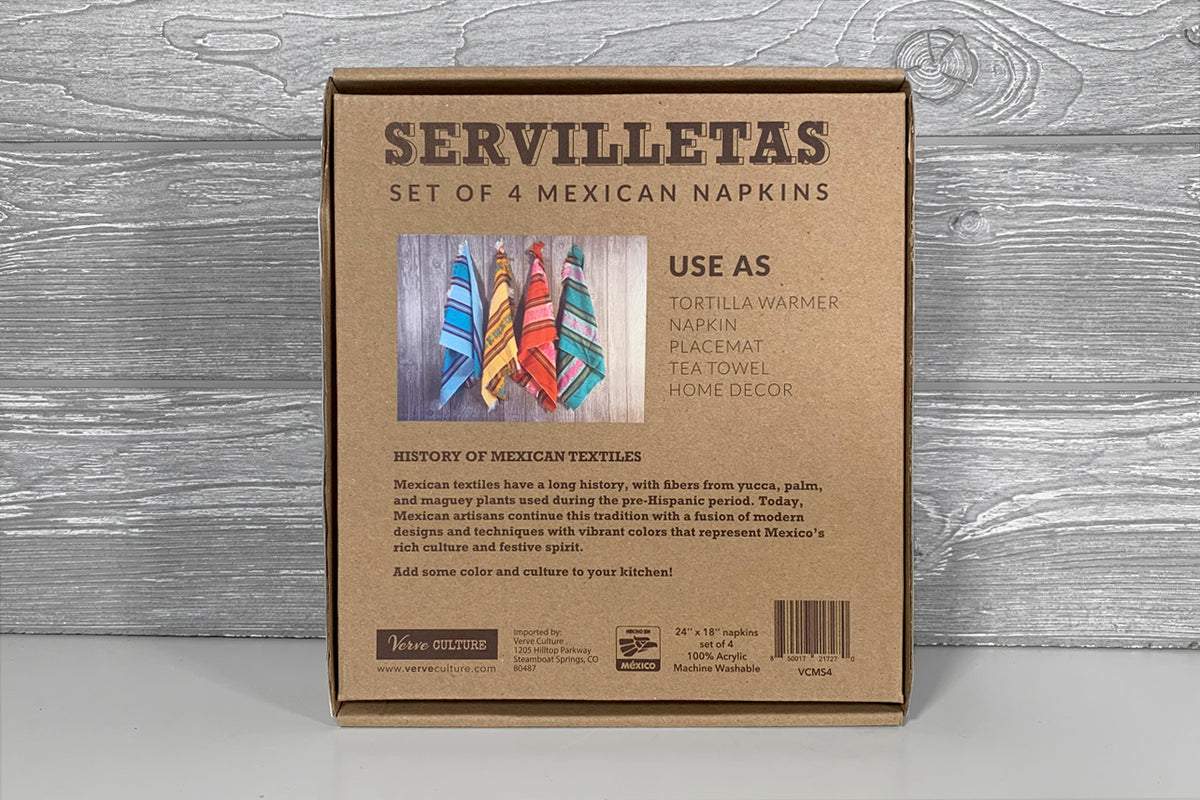 Brown cardboard box containing set of four Mexican napkins with colorful striped patterns in blue, yellow, red, and green.