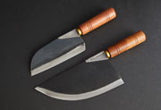 Three knives with curved stainless steel blades and wooden handles with brass accents on dark background.